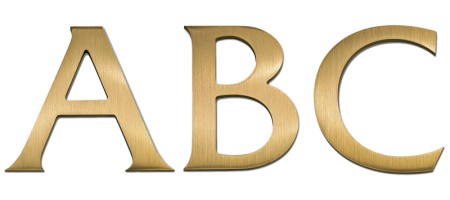 Image of Gemini cast metal letter in FRIZ QUADRATA font style.